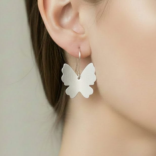 sterling silver butterfly shaped dangle earrings handmade from 925 silver by a small one-woman business in Nottingham called Bottlebee