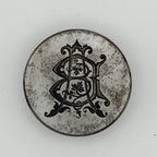 Decorative steel jewellery impression die with intricate design on a white background handmade by Bottlebee in Nottingham