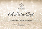 Bottlebee jewellery gift voucher with a glittery background, jewellery is handmade by a small ethnic goldsmith jeweller called Bottlebee in Nottingham sustainable gold and silver jewellery