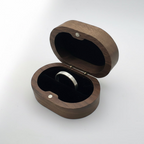 3mm silver wedding ring with a matte satin finish in a wooden jewellery box in a light grey background. Handmade jewellery made in Nottingham by Bottlebee 
