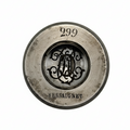 Metallic jewellery impression die with '299' and 'Hessaiguet' text on a white background