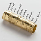 Solid gold wedding rings with textured patterns on a white background, labeled with design names, handmade in Nottingham by Bottlebee who makes unique bespoke sustainable jewellery