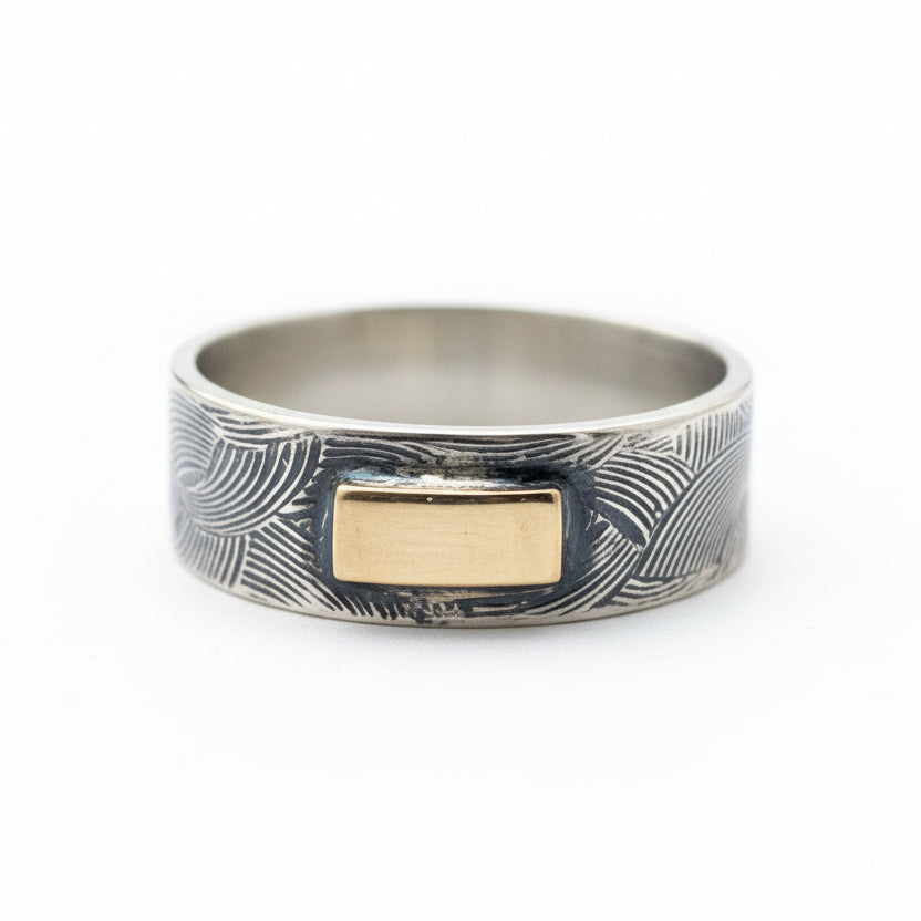 sterling silver ring with an oxidised pattern and a solid 9ct gold block, handmade bespoke jewellery Nottingham
