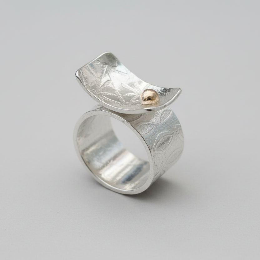 Silver and gold ring with textured surface handmade sustainable nottingham