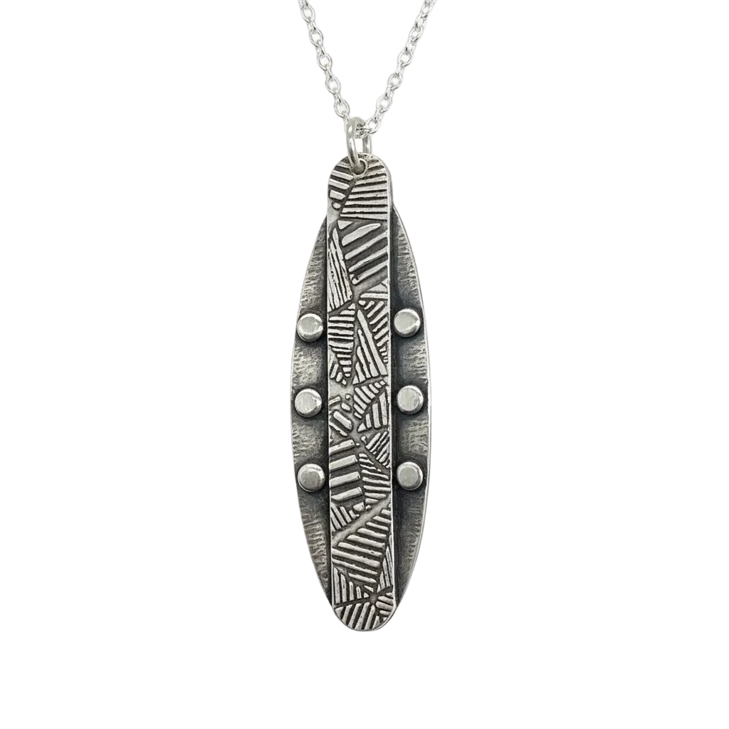 Solid 925 sterling silver feather-shaped pendant with a geometric texture and small dot elements on a white background
