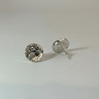 Small sterling silver round stud earrings with intricate and oxidised bee designs on a white surface handmade by Bottlebee who makes jewellery in Nottingham, commissions are welcome