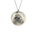 handmade sterling silver pendant with a unique flea in a top hat riding a bike hamdmade by Bottlebee  who makes sustainable bespoke jewellery in Nottingham