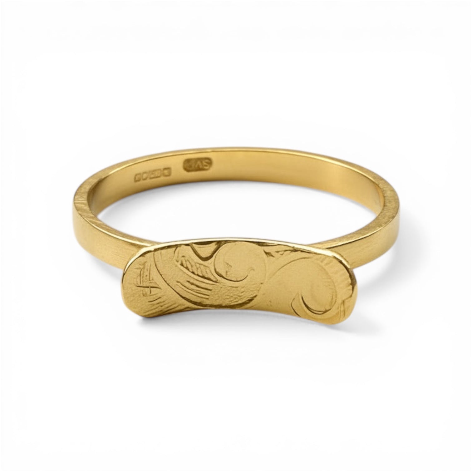 handmade solid gold patterned unique alternative engagement ring sustainably handmade in nottingham on a white background