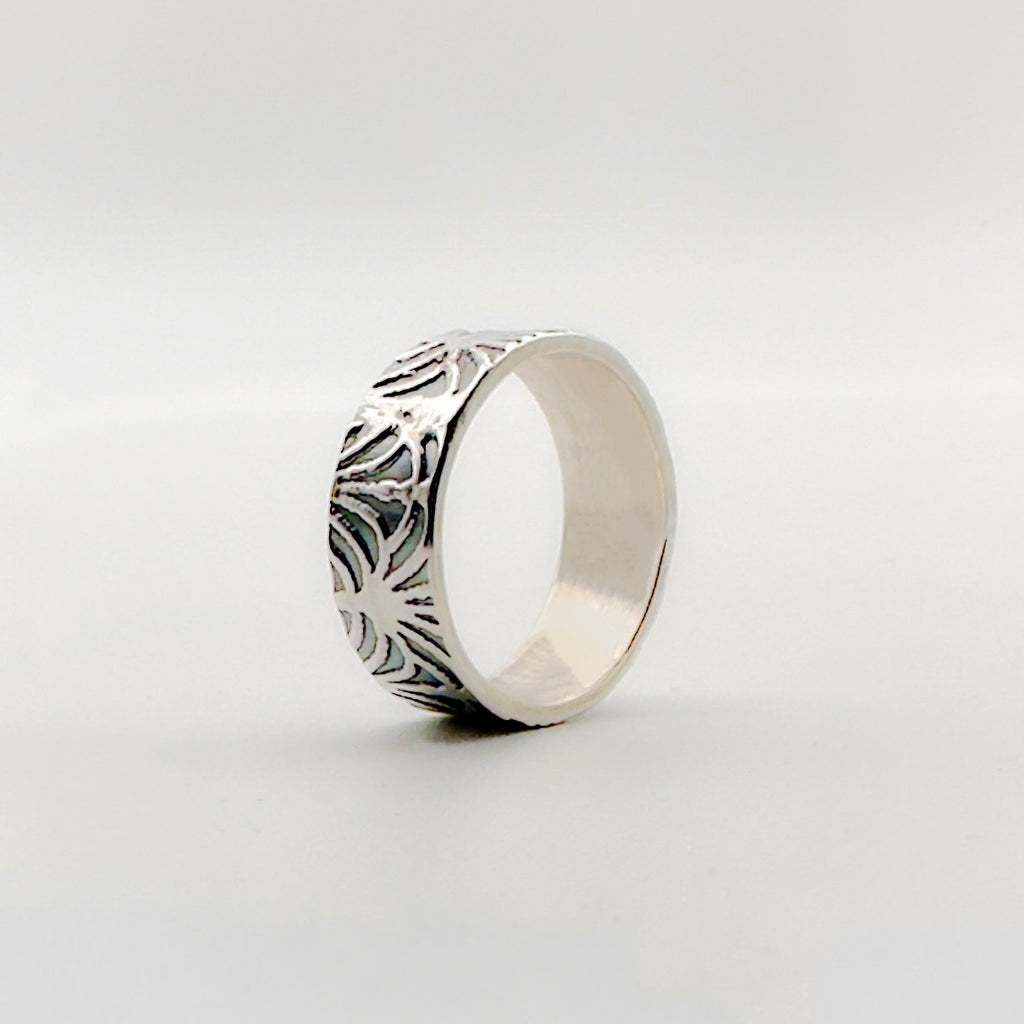 Sterling silver wedding ring set couples in an art deco design, the wedding band is handmade by Bottlebee who makes sustainable bespoke jewellery in Nottingham