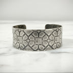 Solid sterling silver cuff with a geometric pattern and textured surface sustainably made in Nottingham by Bottlebee