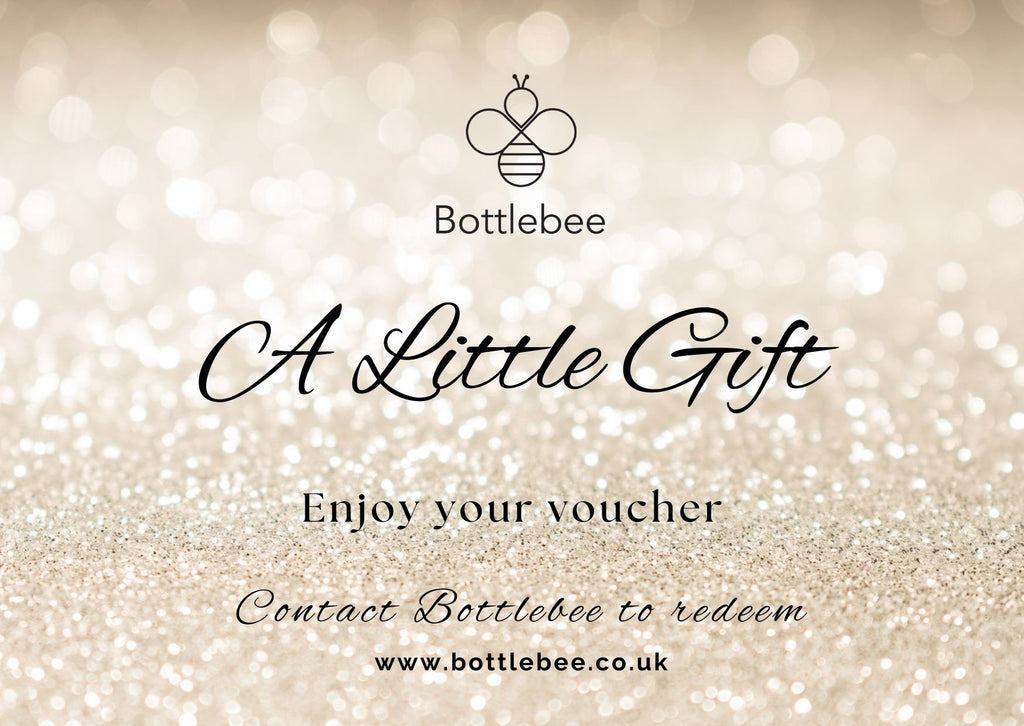 Bottlebee jewellery gift voucher with a glittery background, jewellery is handmade by a small ethnic goldsmith jeweller called Bottlebee in Nottingham sustainable gold and silver jewellery