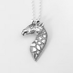 bespoke Nottingham jewellery sustainable silver giraffe head  pendant on a chain against a white background