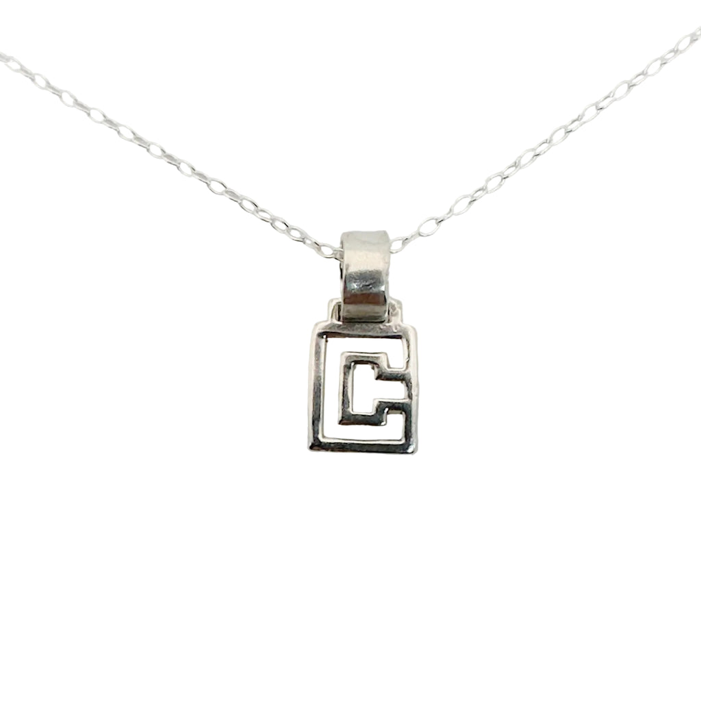 Silver pendant on a thin chain with a greek design pendant handmade by Bottlebee in Nottingham who makes sustainable silver   bespoke jewellery