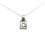 Silver pendant on a thin chain with a greek design pendant handmade by Bottlebee in Nottingham who makes sustainable silver   bespoke jewellery