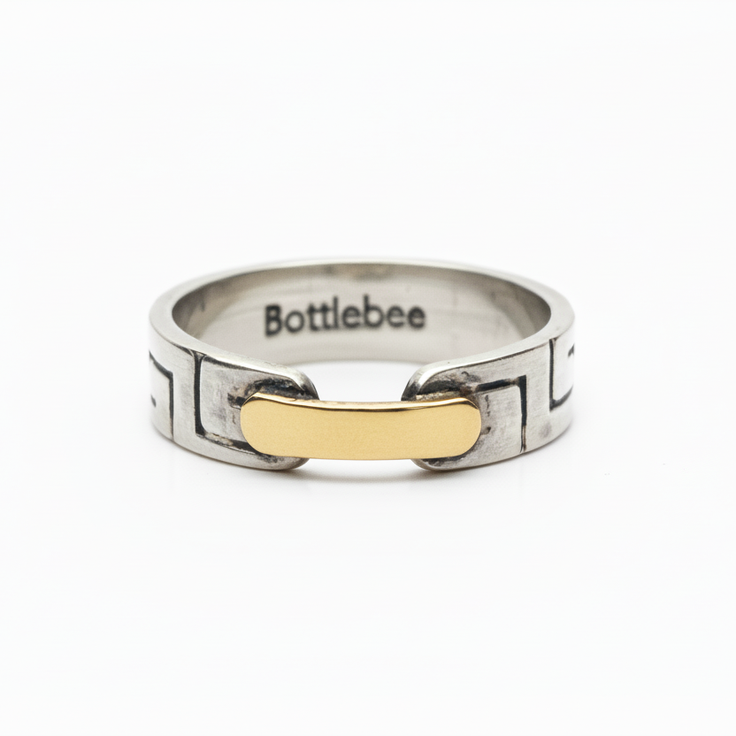 sterling silver and gold ring with greek style pattern
