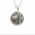 Sterling silver pendant with a detailed raised frog amphibian impression and a silver belcher necklace