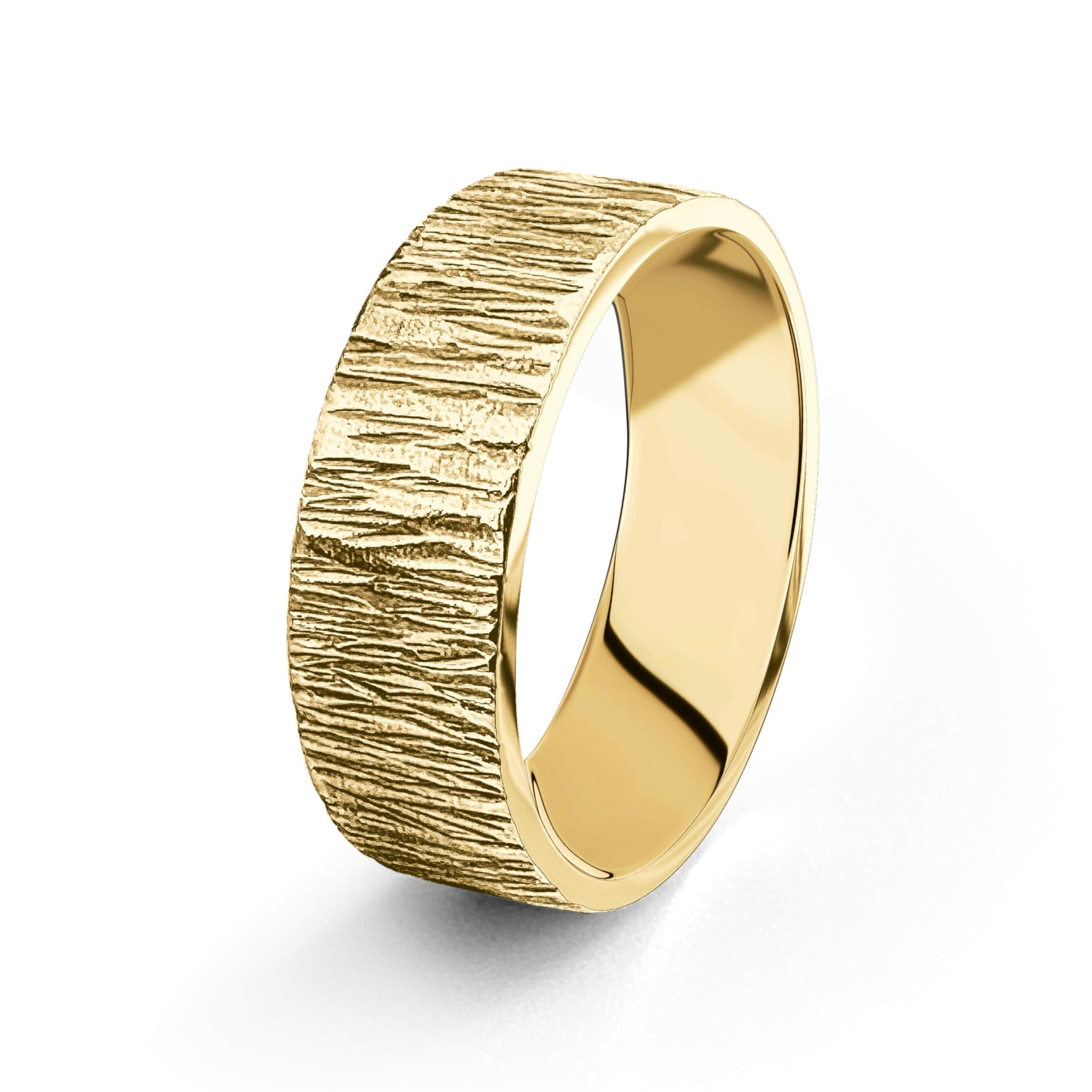 Solid gold line bark textured wedding ring band in 9ct gold, handmade in Nottingham by a one woman business who makes sustainable bespoke jewellery 