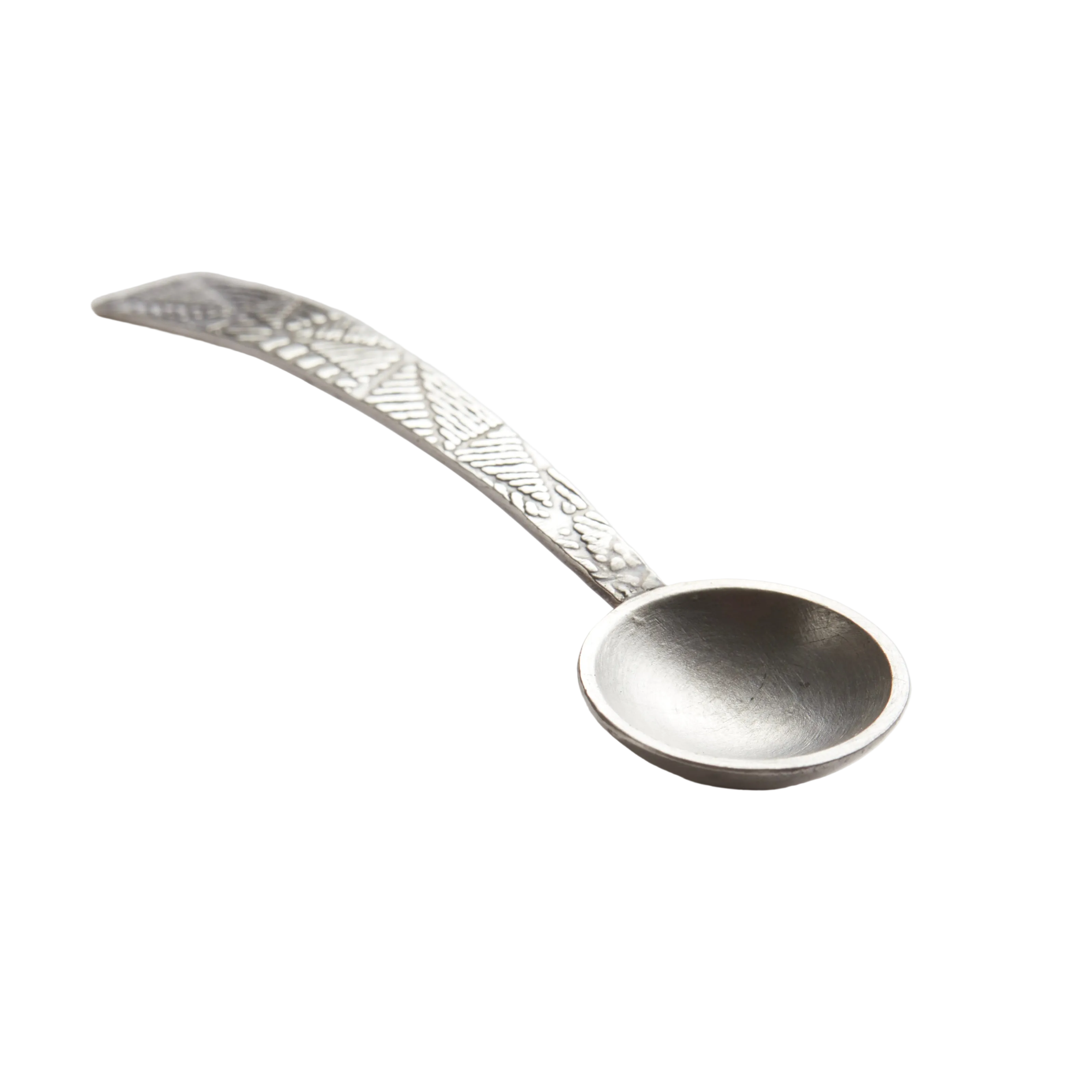 Decorative handmade solid silver spoon on a white background