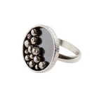 Silver bespoke handmade sterling silver ring with balls in an oxidised bezel made in Nottingham by an independent jeweller in Nottingham 
