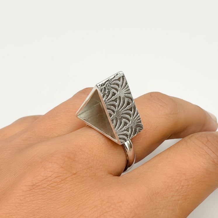 Unisex sterling silver alternative brutalist rig with a pattern on each side, handmade sustainable by Bottlebee in Nottingham who makes bespoke jewellery