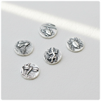 Set of silver charms to handmade silver or gold jewellery with insect designs on a white background