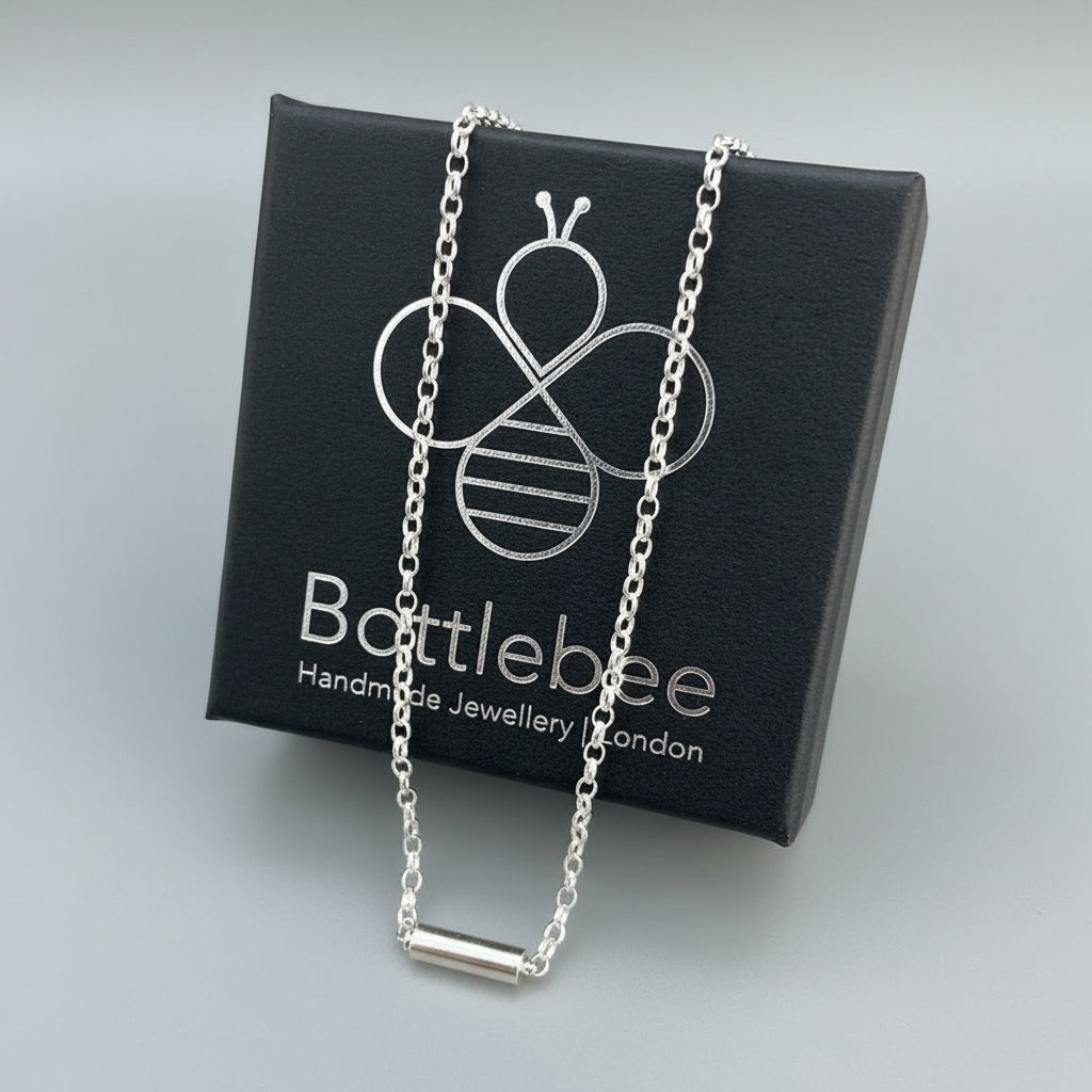 handmade sterling silver minimalist kinetic necklace for man or woman handmade by a small business Bottlebee Nottingham