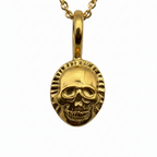 sustainable gold skull pendant necklace on a white background handmade by Bottlebee in Nottingham