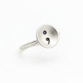 Solid sterling silver ring with a semi colon design on a white background, handmade jewellery Nottingham