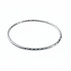 Sterling silver handmade jewellery bangle on a white background made by Bottlebee small business in Nottingham