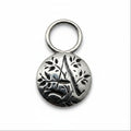 Silver pendant tag with floral gothic initial A for a necklace or keyring on a white background