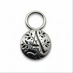 Silver pendant tag with floral gothic initial A for a necklace or keyring on a white background