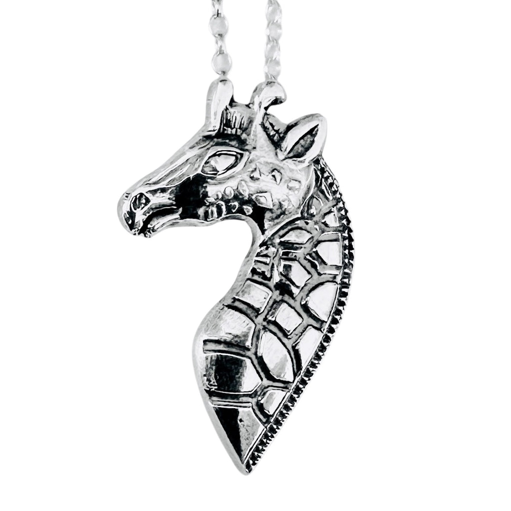 sterling silver giraffe pendant on a white background bespoke sustainable jewellery nottingham