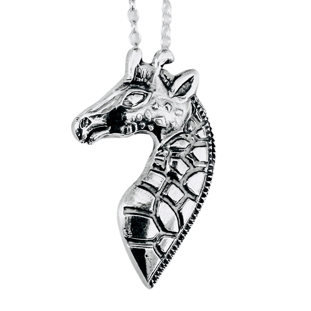 sterling silver giraffe pendant on a white background bespoke sustainable jewellery nottingham