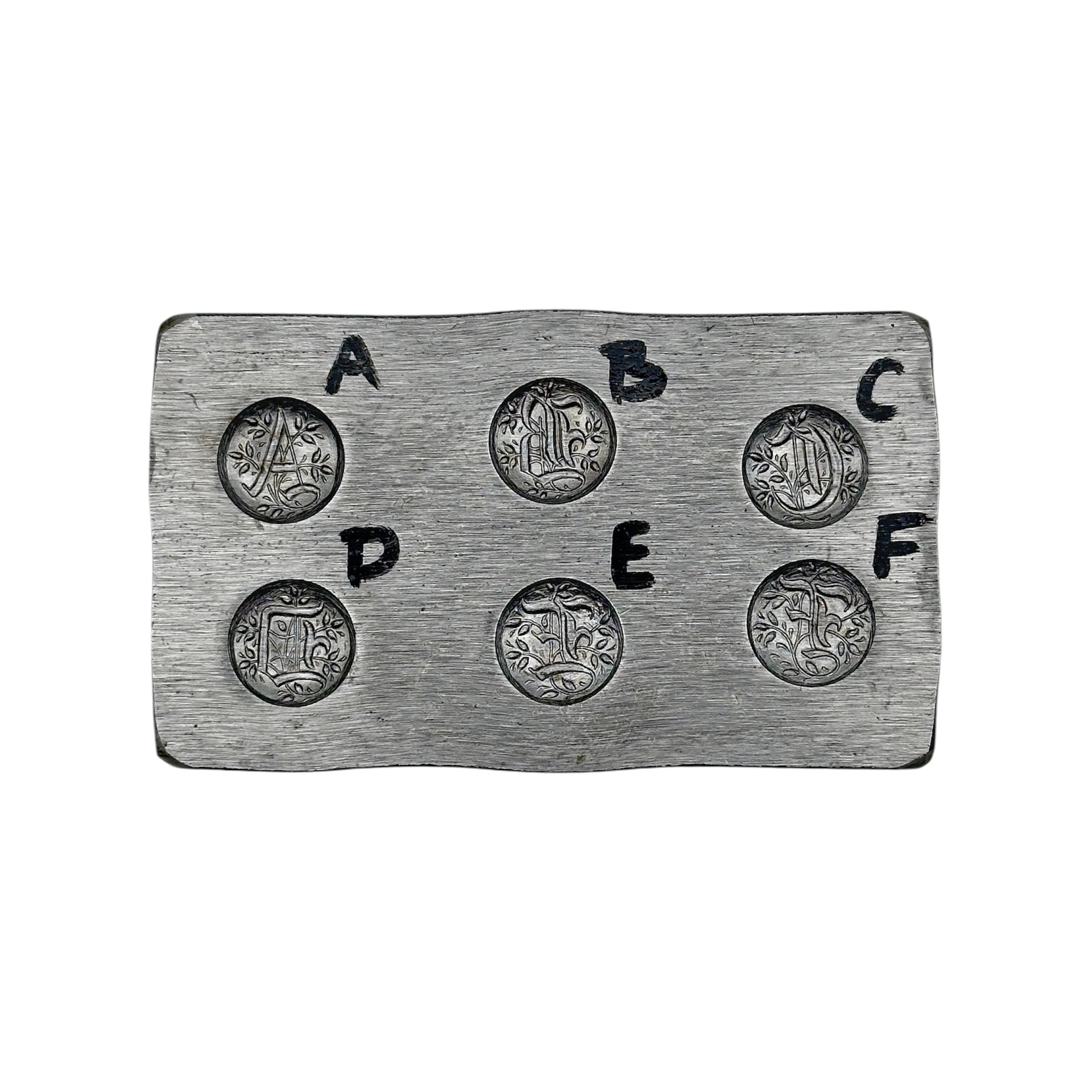 alphabet steel die to make bespoke sustainable personalised jewellery made by bottlebee in nottingham