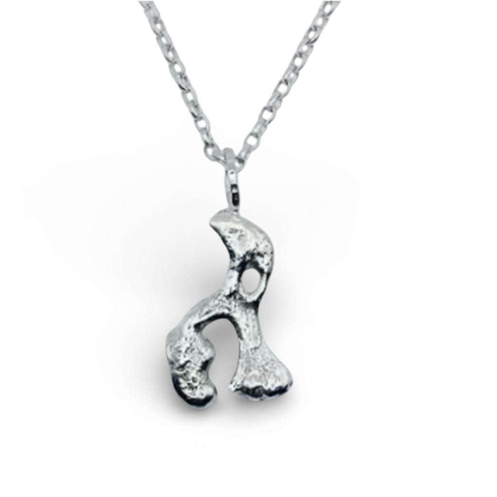 Handmade sterling silver necklace in an elephant hippo rhino shape handmade by Bottlebee in Nottingham