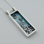 Silver rectangular box pendant necklace with accents which have been oxidised, necklace handmade by Bottlebee in Nottingham who makes sustainable bespoke jewellery