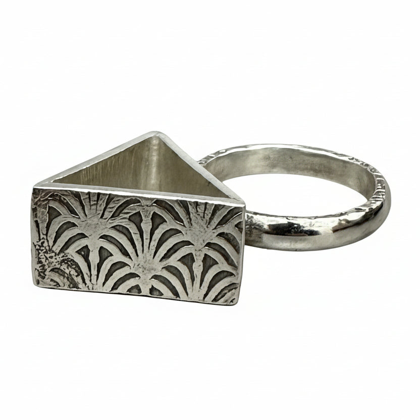 Sterling silver alternative brutalist rig with a pattern on each side, handmade sustainable by Bottlebee in Nottingham who makes bespoke jewellery