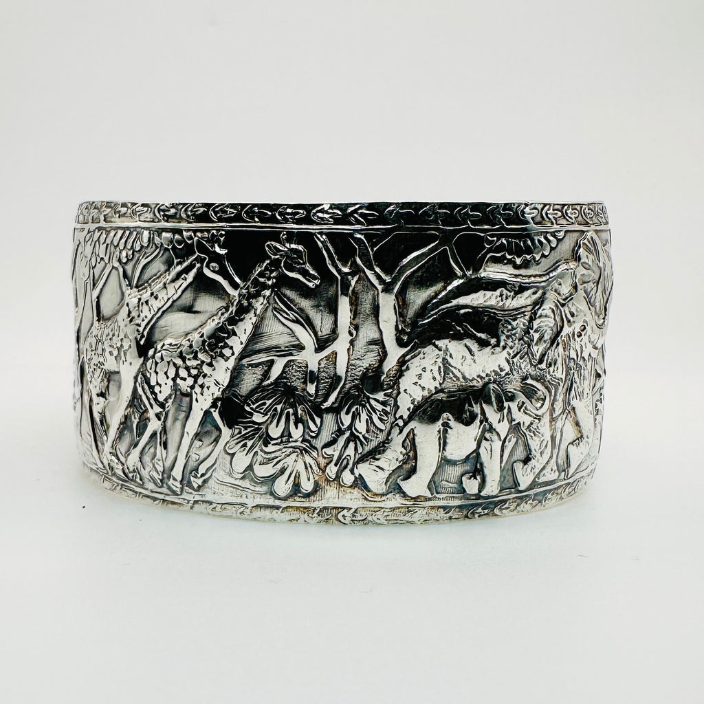 Eyecatching silver cuff for man with animal embossments handmade silver jewellery made for man and bespoke by Bottlebee in Nottingham sustainably
