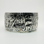 Eyecatching silver cuff for man with animal embossments handmade silver jewellery made for man and bespoke by Bottlebee in Nottingham sustainably