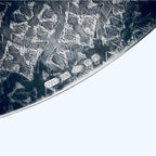 Close-up of a handmade bespoke cuff with art deco patterns and hallmark on white background made buy a small business based in Nottingham