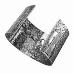 Silver cuff bracelet with intricate art deco pattern on a white background handmade by Bottlebee in Nottingham